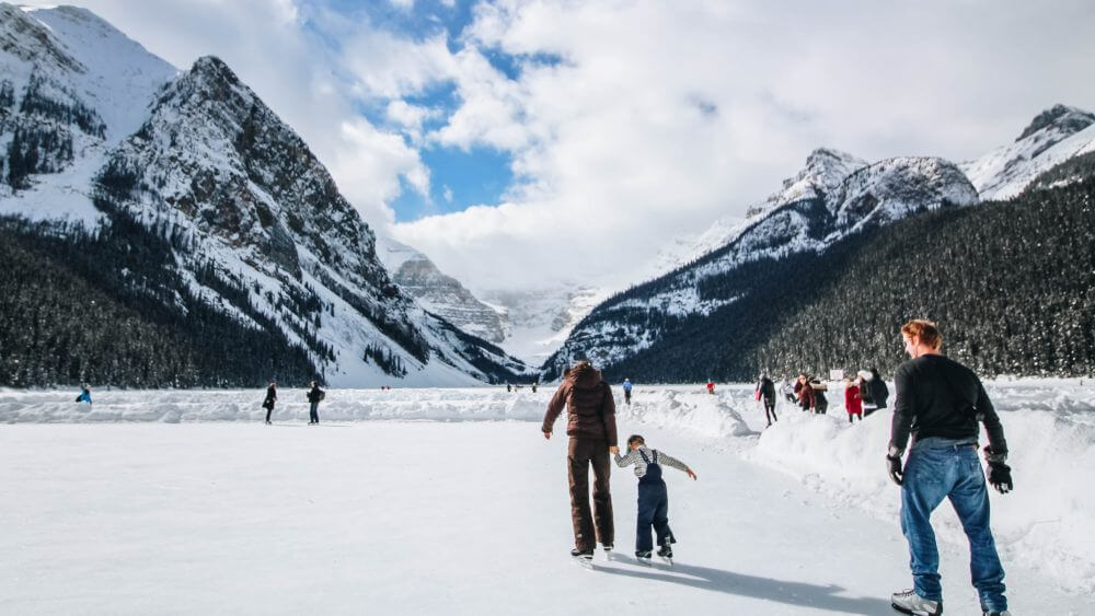 winter skating on lake louise with mountain backdrop gallery pic