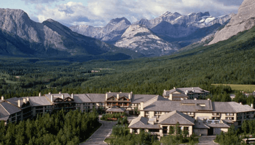 pic of kananaskis village pomeroy hotel with mountain view in back ground
