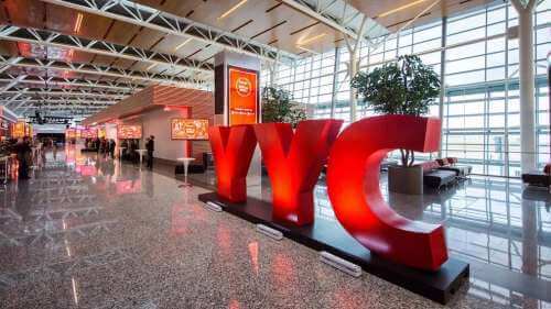YYC welcome sign in new International section of airport