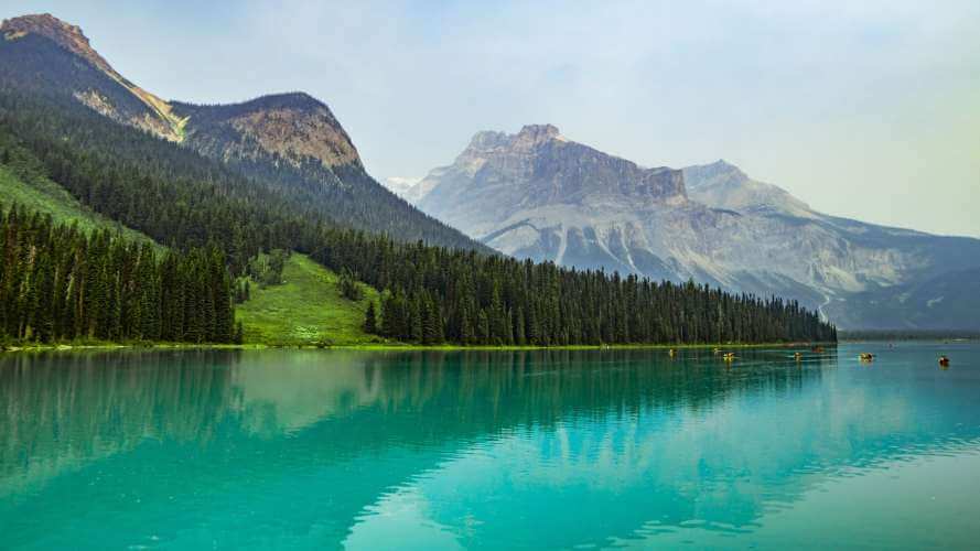 Emerald Lake, Yoho National Park , is tranquil.  The easy hike on the west side of the lake that you along extremely scenic path with colours that stand out.  Makes you feel like you are inside the picture.  