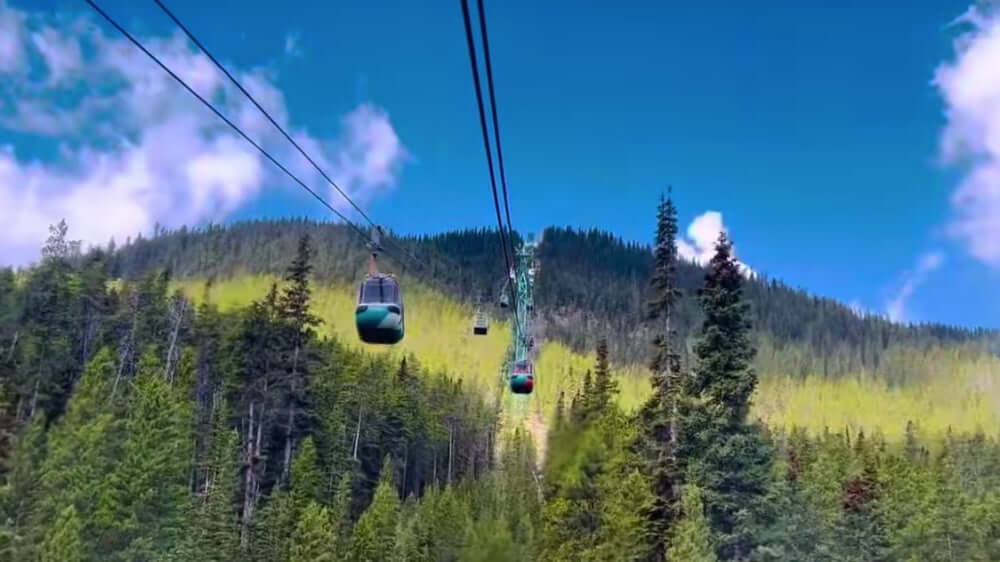 Banff gondola looking up to the top right underneath the cables
