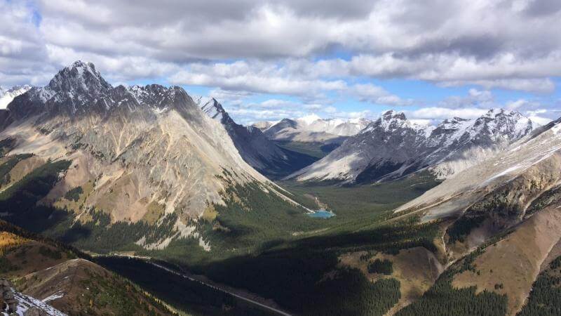pocaterra ridge top of mountain looking down valley sunny day kananaskis hiking