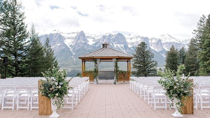 Silvertip Mountain Weddings Ceremony backdrop of snow peaked views.  Breath taking