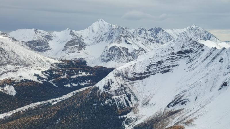 south pocaterra ridge winter scene top of the mountain looking down on valley