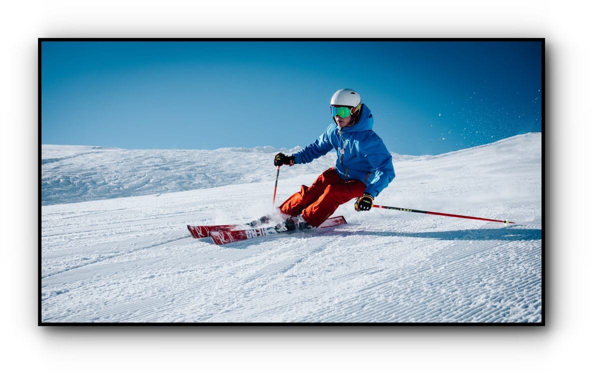 skiing down that fresh blue bird day welcome about us show our brush strokes 16x9 1000 image