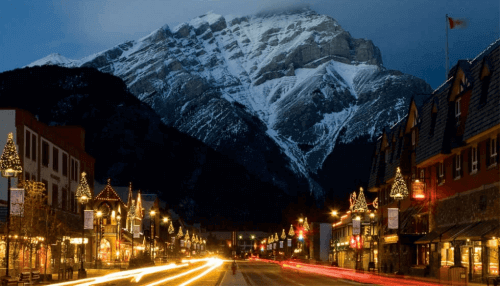 night life banff downtown with view of cascade mountain