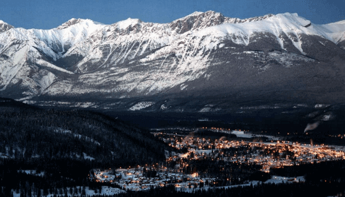 ATHABASCA FALLS picture with mountains in back ground